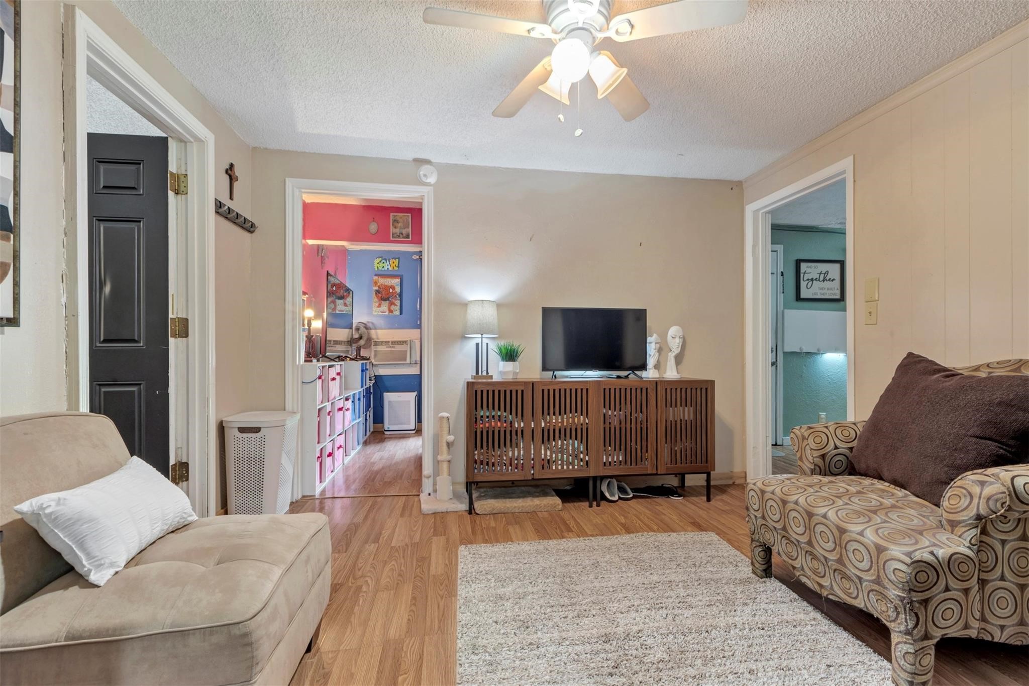 808 Morrell Street Baytown, TX 77520 - Photo 11 of 25 a living room with furniture and a couch