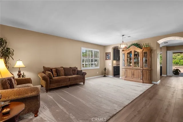 a living room with furniture and window