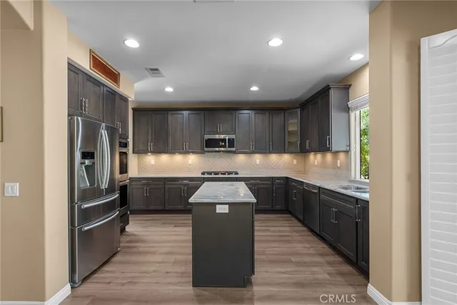 a living room with furniture rug and window