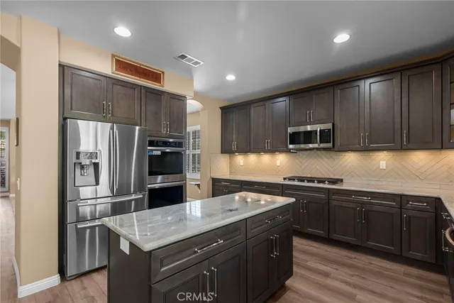 a living room with furniture or couch and a fireplace