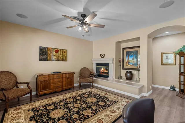 a room with window wooden floor and furniture