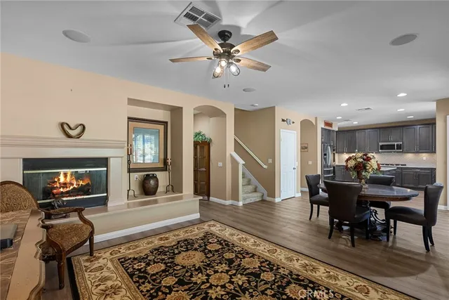 a view of room with window and ceiling fan