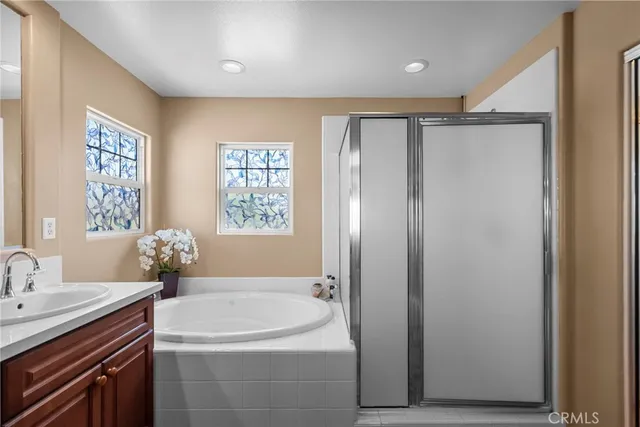 a view of a chair and table in the balcony