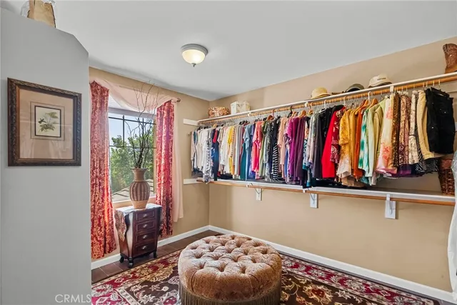 a view of a house with a backyard porch and sitting area