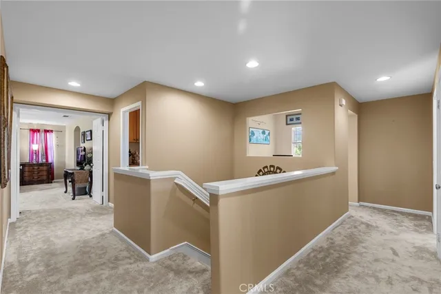 a view of a backyard with sitting area