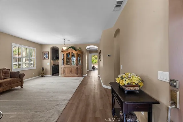a living room with furniture and window