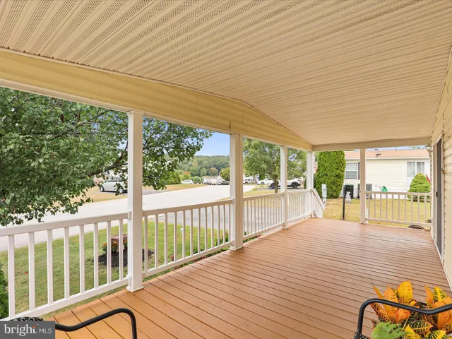 a view of a patio with wooden floor and outdoor space