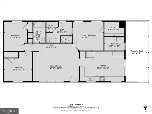 a black and white photo of a bench