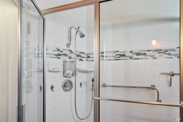 a view of a house with backyard and a tree