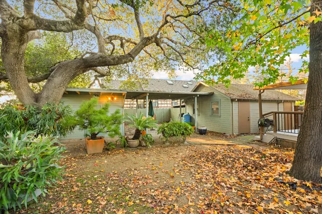 a backyard of a house with lots of green space