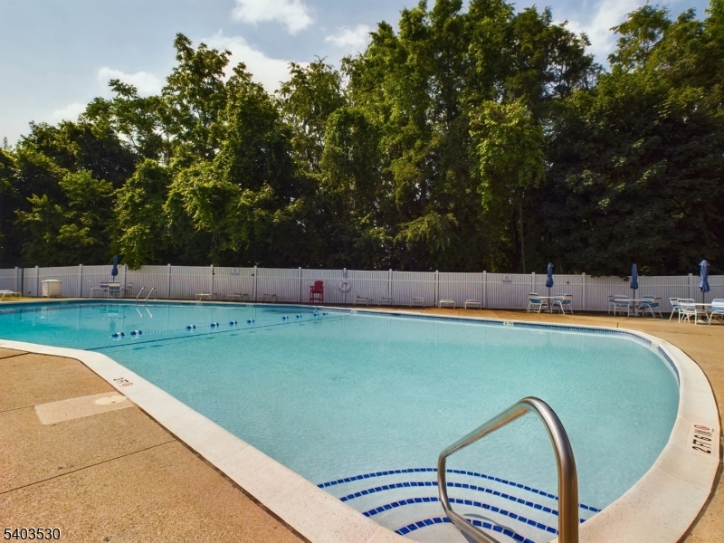 1130 Valley Road, Unit 2A Wayne, NJ 07470 - Photo 15 of 19 a view of a swimming pool with a yard
