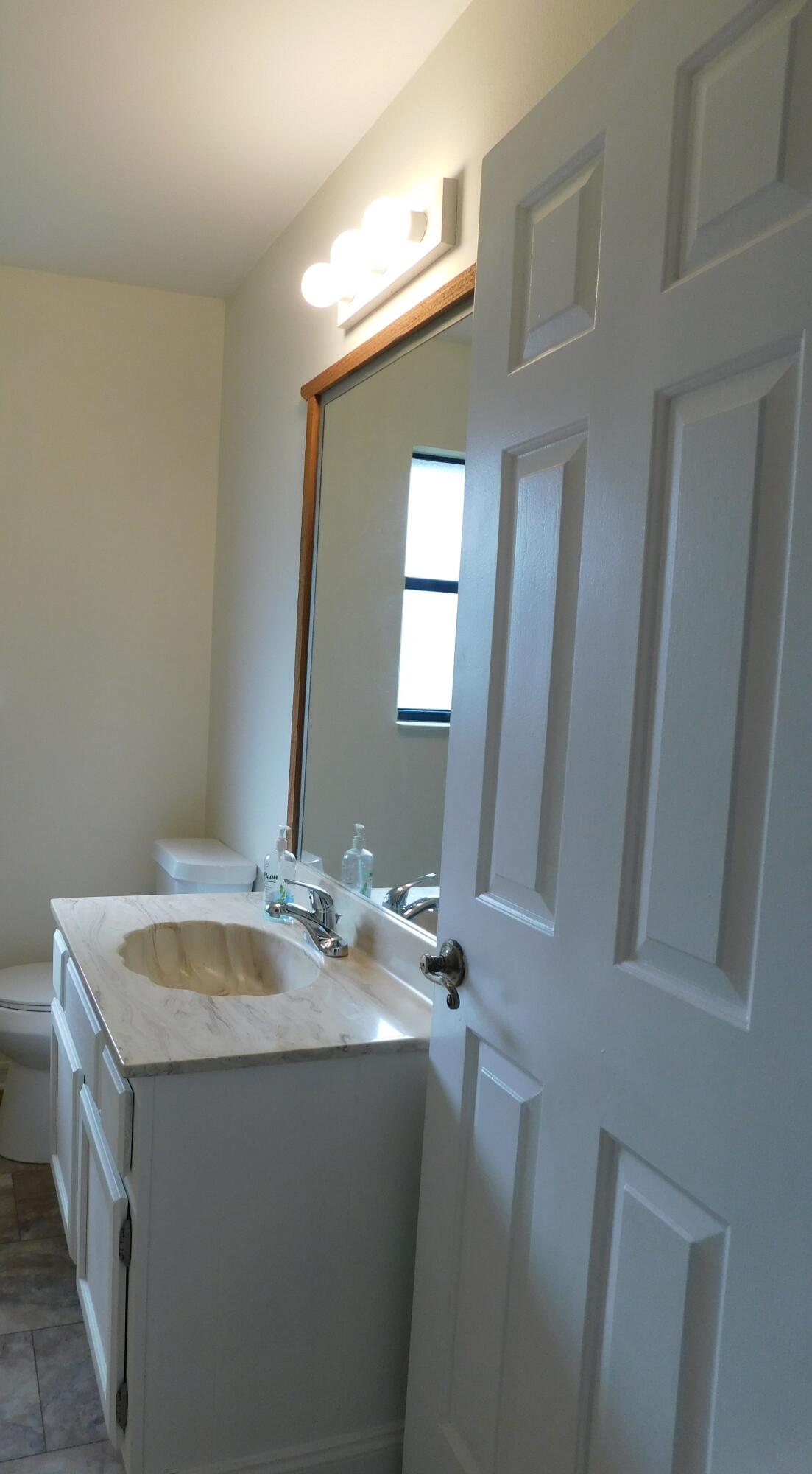6605 Pensacola Road Fort Pierce, FL 34951 - Photo 13 of 31 Guest Bathroom