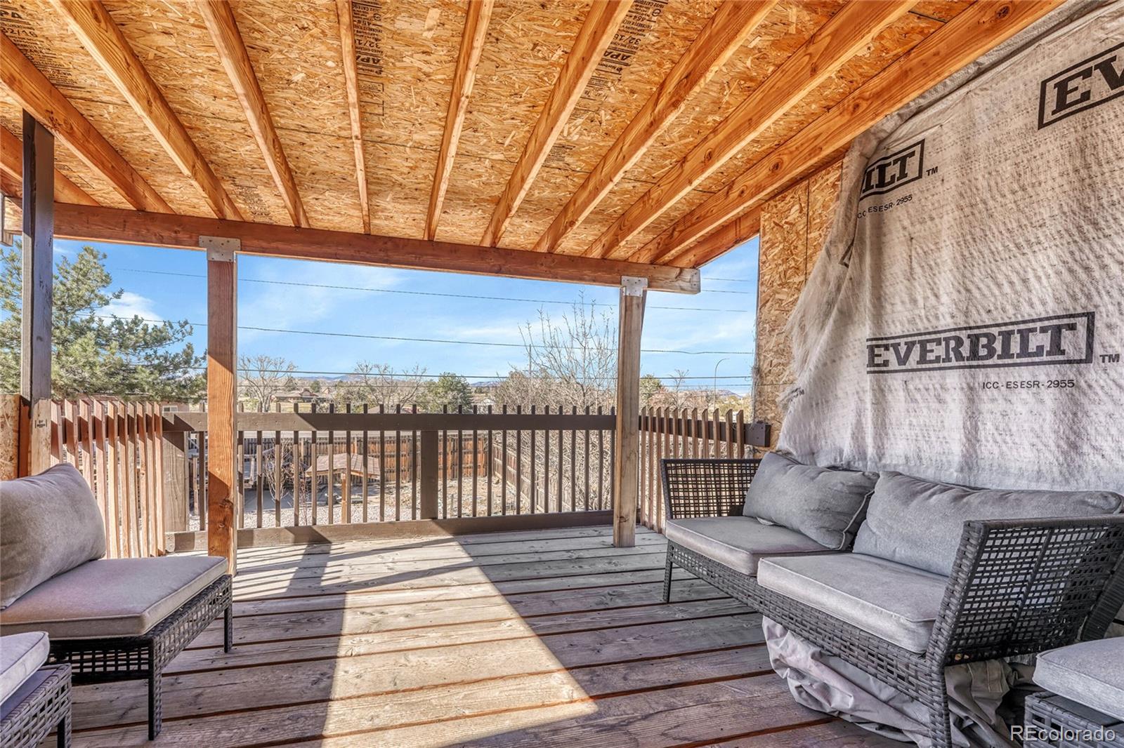7461 Webster Street Arvada, CO 80003 - Photo 19 of 31 a view of a balcony with furniture