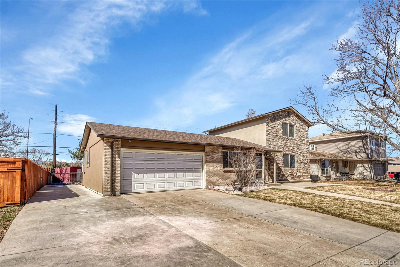 7461 Webster Street Arvada, CO 80003 - Photo 2 of 31 a view of a house with a outdoor space