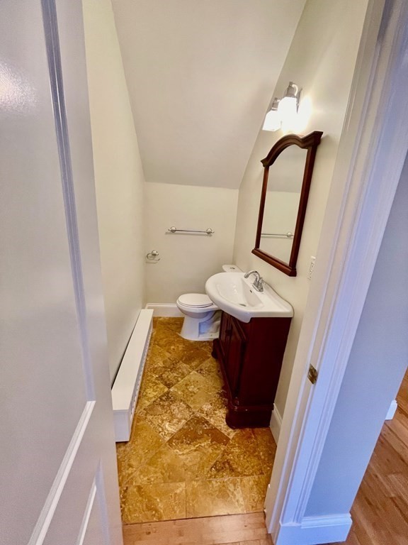 13 Worcester Square, Unit 2 Boston, MA 02118 - Photo 14 of 16 a bathroom with a bathtub and sink