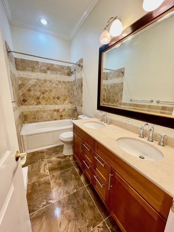 13 Worcester Square, Unit 2 Boston, MA 02118 - Photo 10 of 16 a bathroom with a sink and a mirror