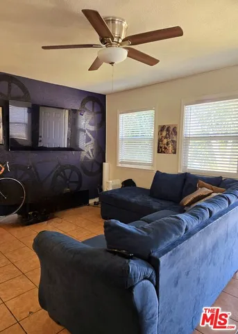 a house with a tree in front of it