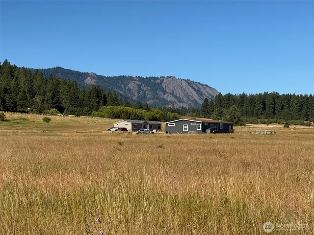 a view of a lake with houses in background