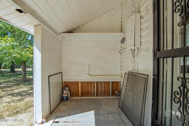a view of a tree in front of a house