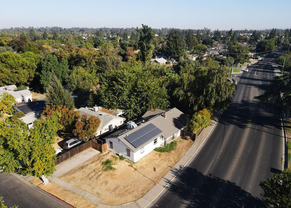 2525 R Street Merced, CA 95340 - Photo 5 of 12 an aerial view of a house with a yard basket ball court and outdoor seating