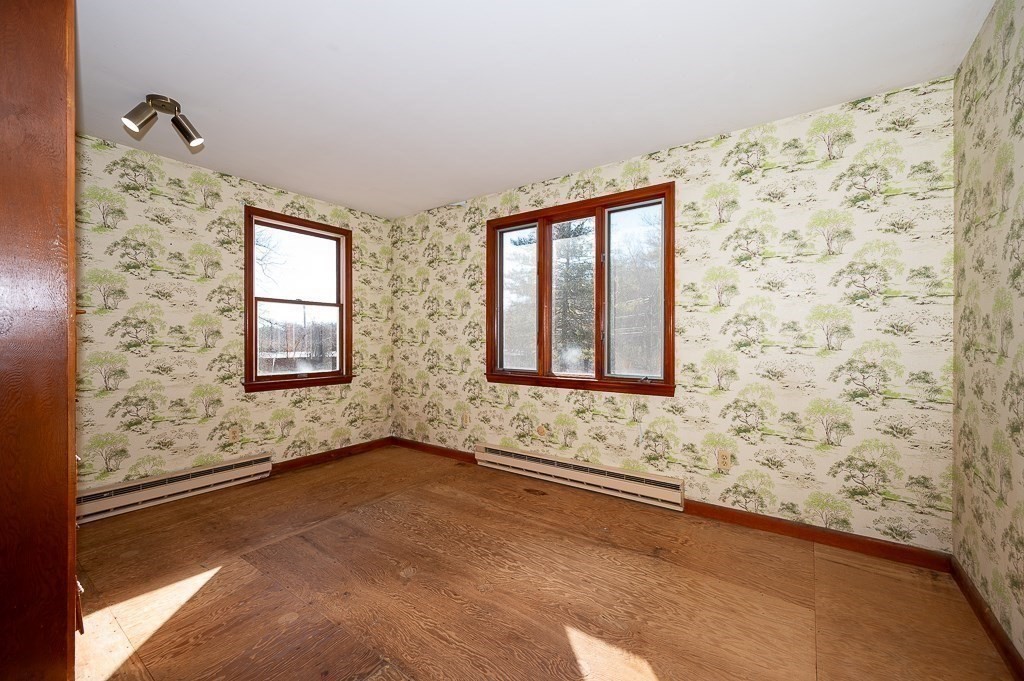 31 Cemetery Street Mendon, MA 01756 - Photo 14 of 39 a bathroom with a bathtub and shower