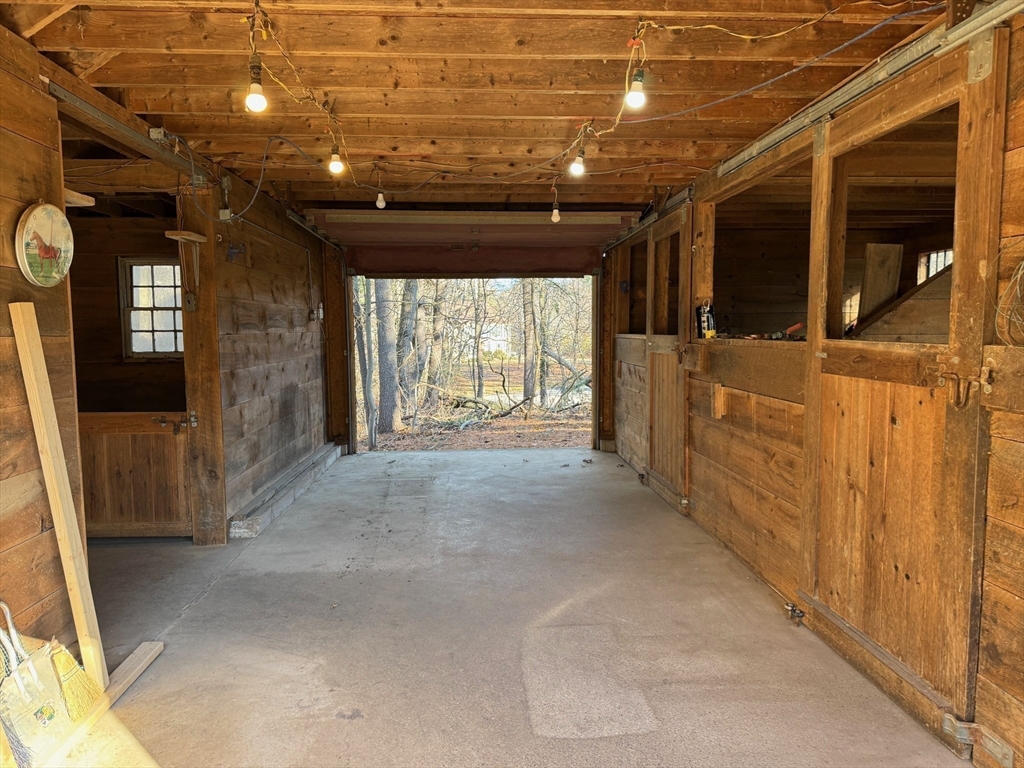 31 Cemetery Street Mendon, MA 01756 - Photo 25 of 39 a view of an empty room with a fireplace
