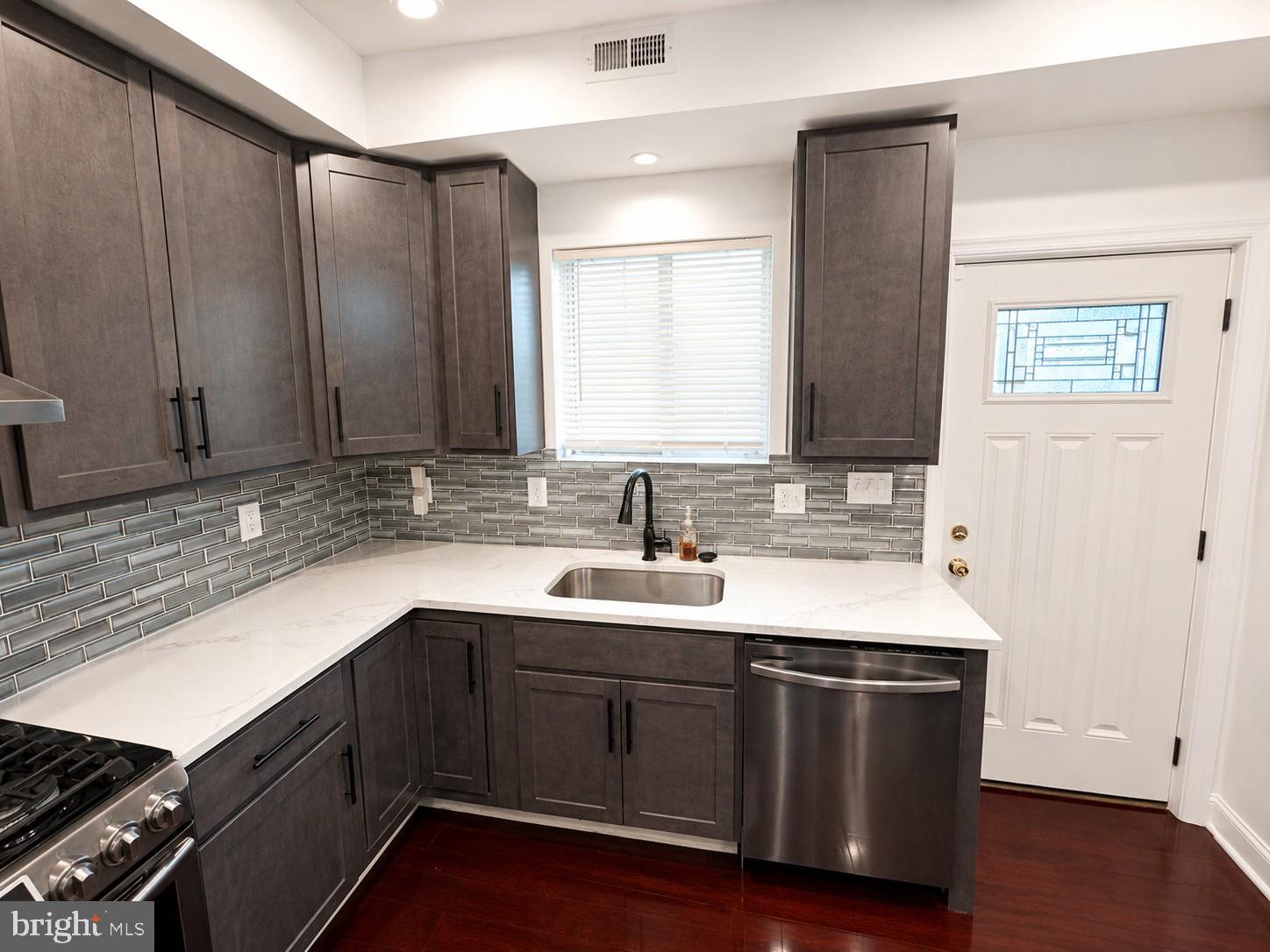 1610 Federal Street Baltimore, MD 21213 - Photo 5 of 27 Modern kitchen with sleek finishes.