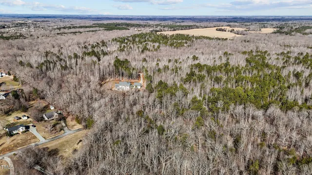 a view of a water with a mountain in the background