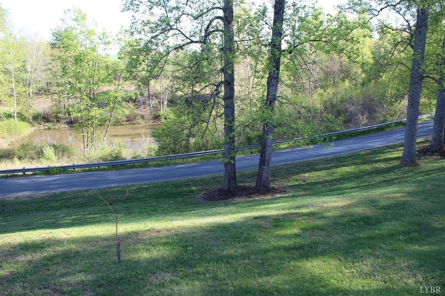 2730 New Chapel Road Rustburg, VA 24588 - Photo 5 of 31 a view of backyard with green space