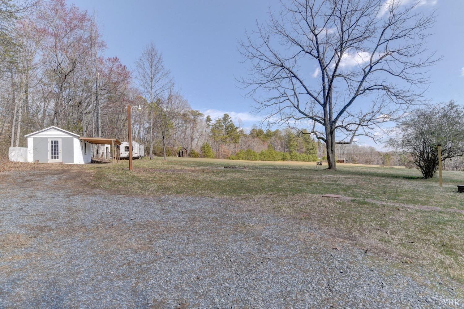 2730 New Chapel Road Rustburg, VA 24588 - Photo 7 of 31 a view of a outdoor space with trees
