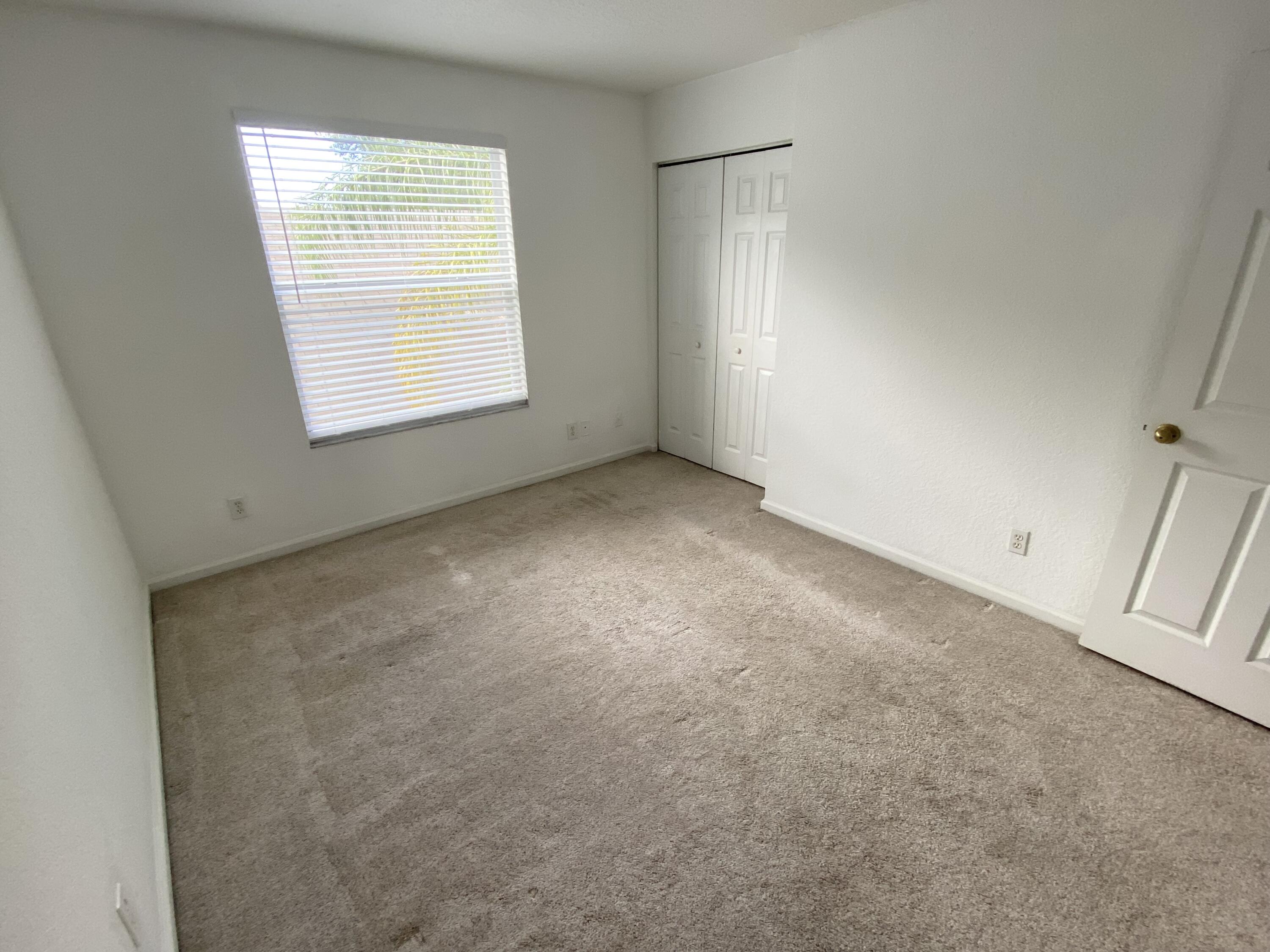 103 Pennock Landing Circle Jupiter, FL 33458 - Photo 13 of 18 an empty room with windows