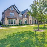 a building with trees in the background