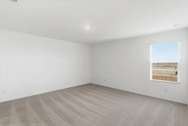 a kitchen with a sink and stainless steel appliances