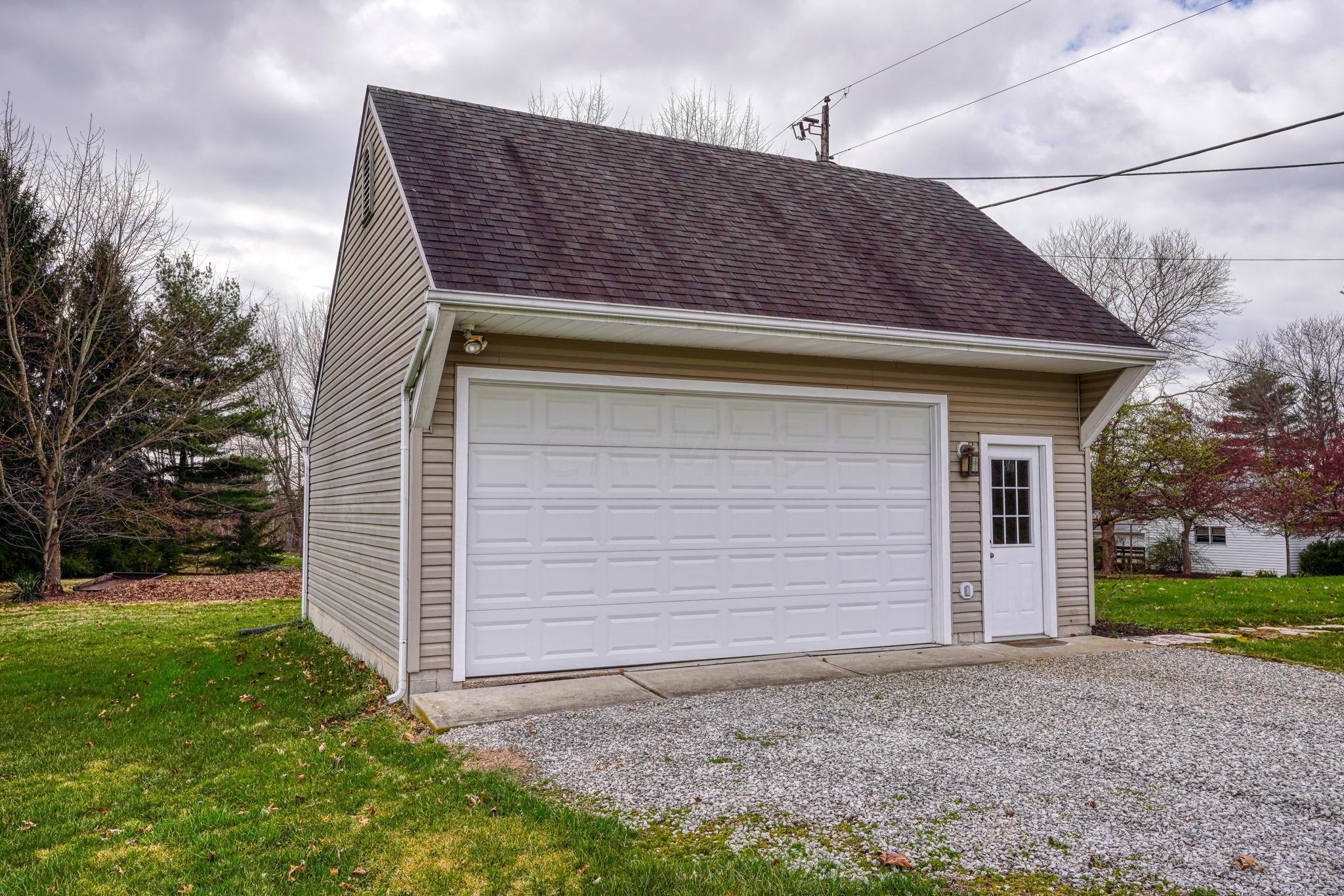 3143 Amanda Northern Road Northwest Carroll, OH 43112 - Photo 43 of 72 2 car detached garage with work bench and storage above