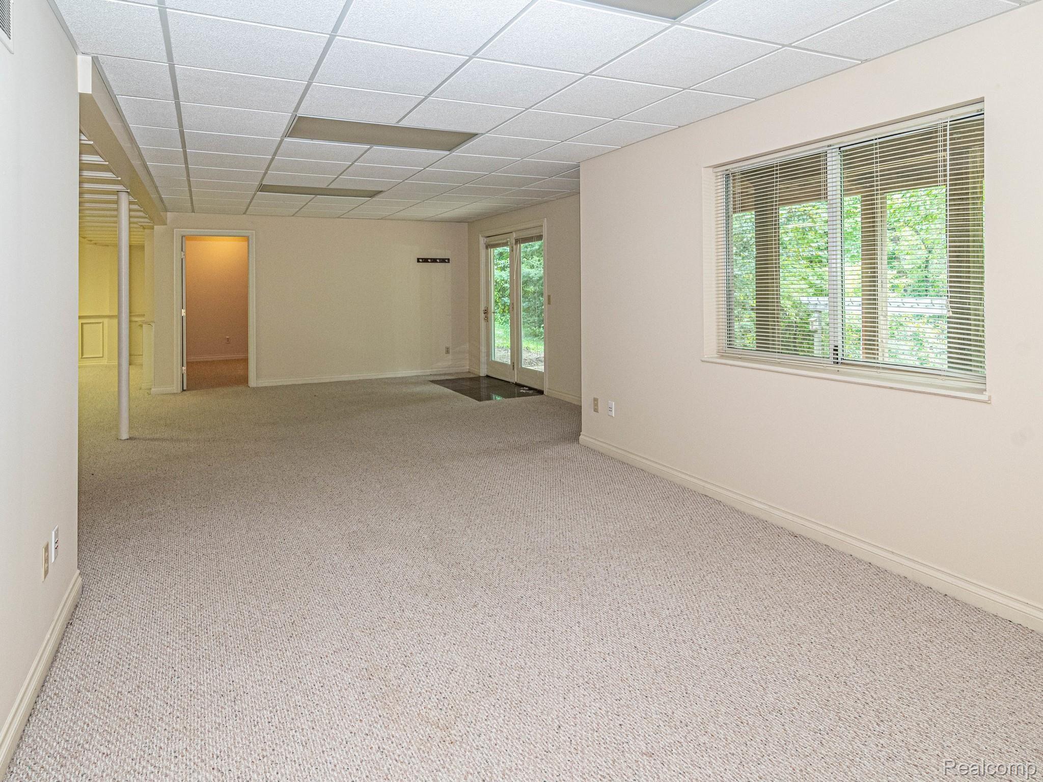 5255 Stickney Road Clarkston, MI 48348 - Photo 42 of 80 Massive Finished Walkout Basement