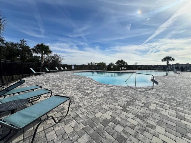 a view of a back yard of the house