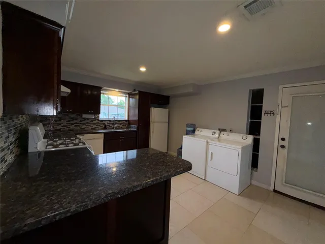 a view of room with gym equipment