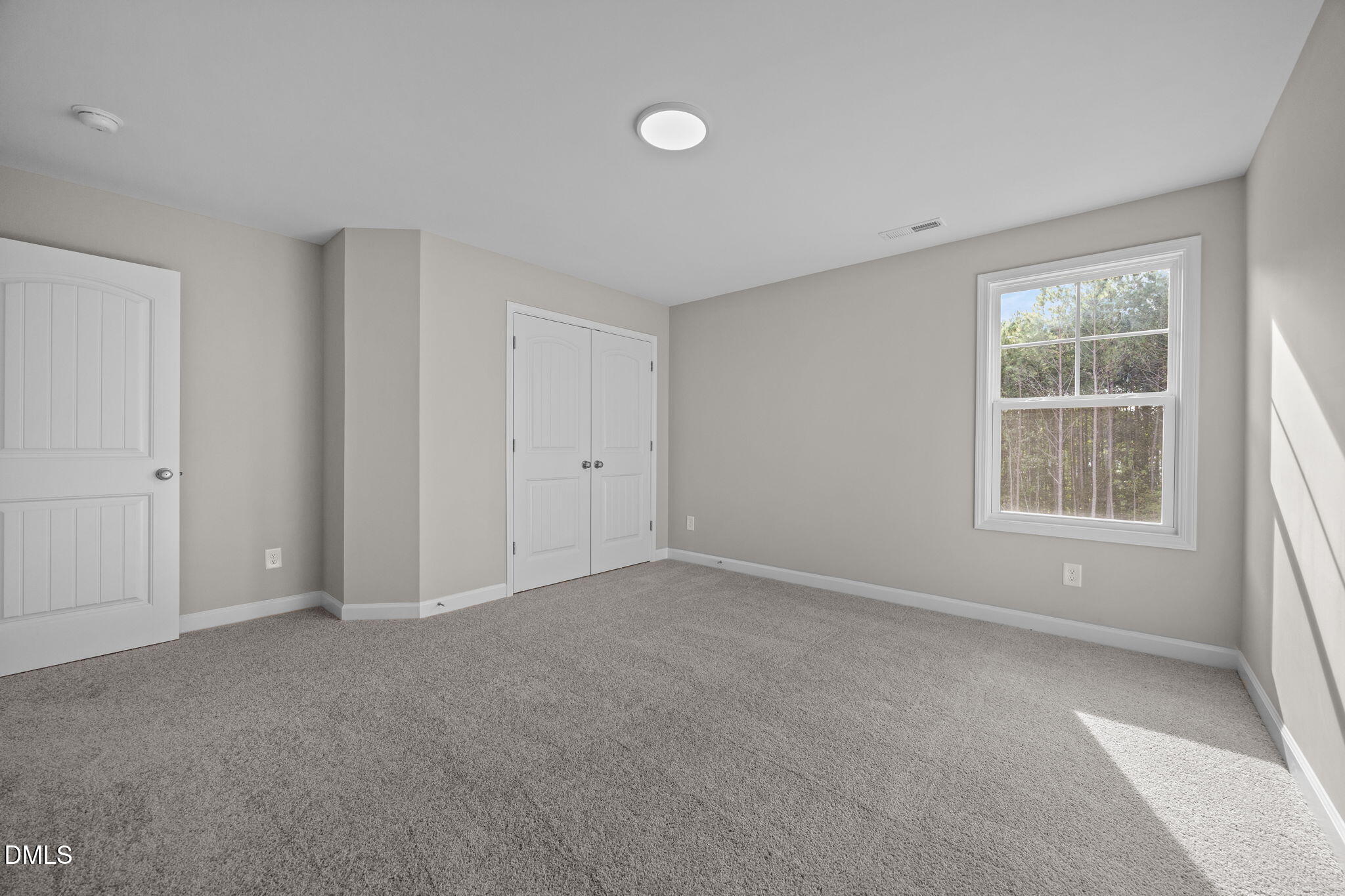74 Cardovia Way Wendell, NC 27591 - Photo 17 of 34 an empty room with windows
