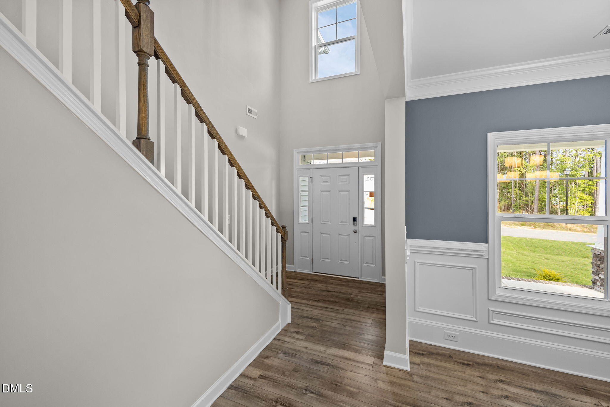 74 Cardovia Way Wendell, NC 27591 - Photo 5 of 34 a view of a hallway with wooden floor and entryway