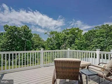 a view of a chair in wooden deck