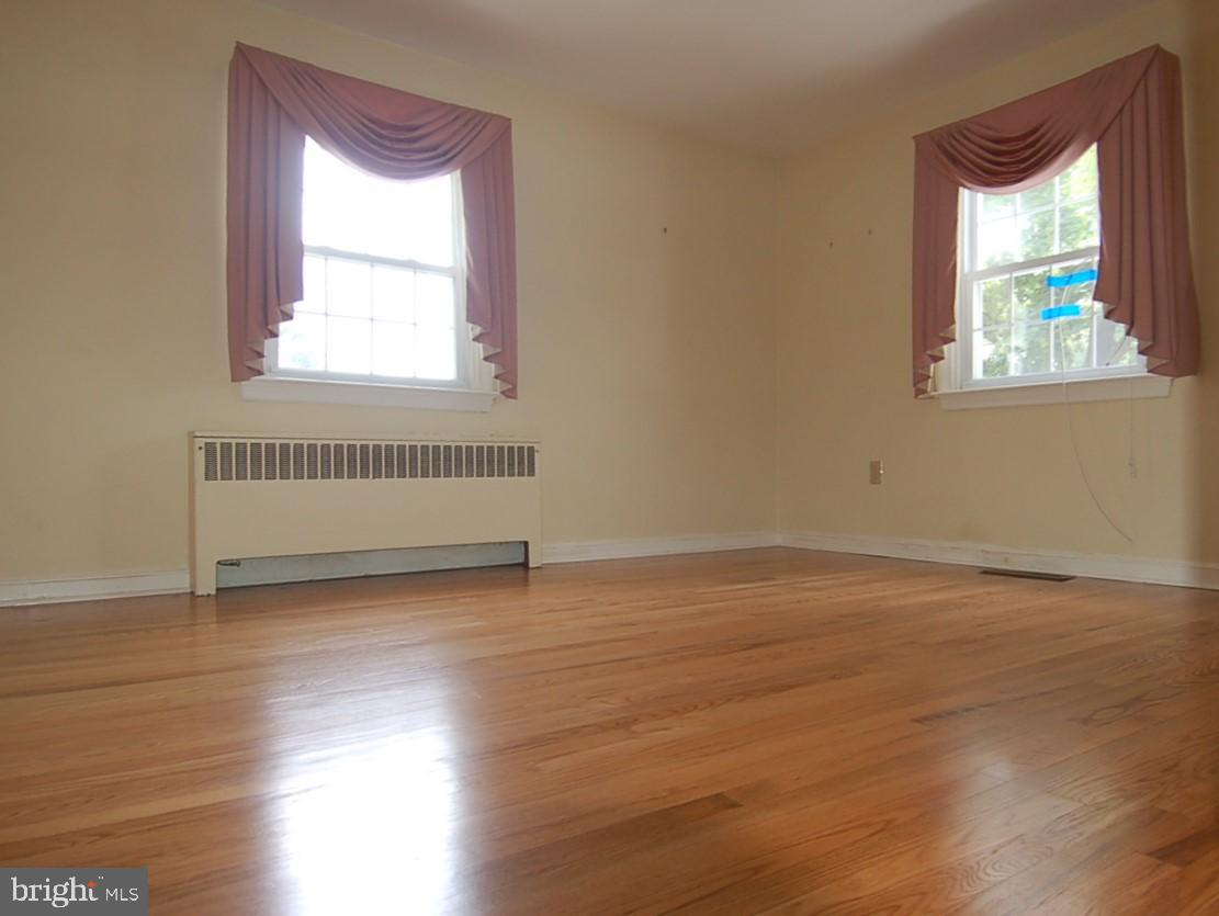 28 Leopard Road Berwyn, PA 19312 - Photo 29 of 32 First Floor Bedroom with refinished Hardwood Floor