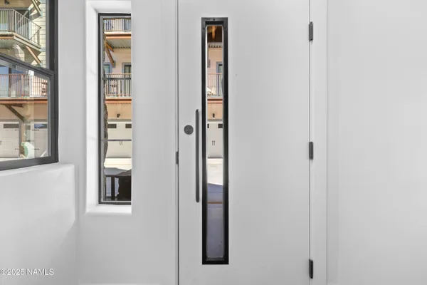 a view of elevator with hallway