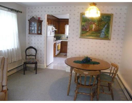 30 Tilden Road Scituate, MA 02066 - Photo 6 of 15 a view of a dining room with furniture and wooden floor