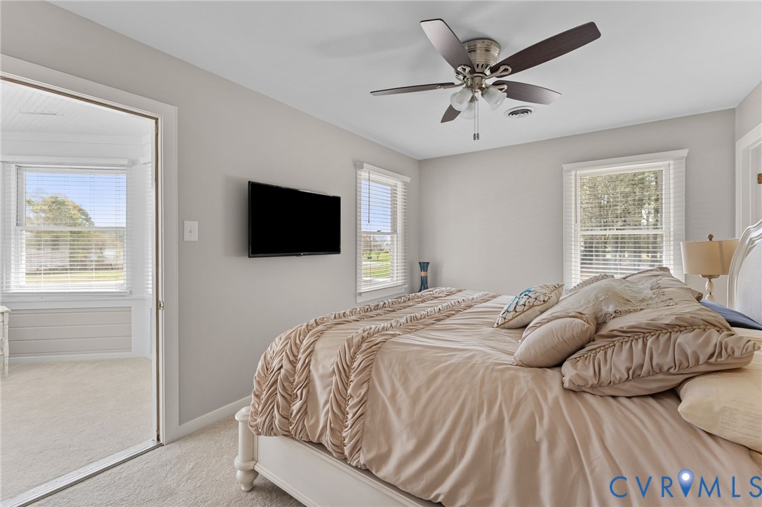 353 Jackson Creek Road Deltaville, VA 23043 - Photo 27 of 48 Primary suite with door to sunroom/sitting room