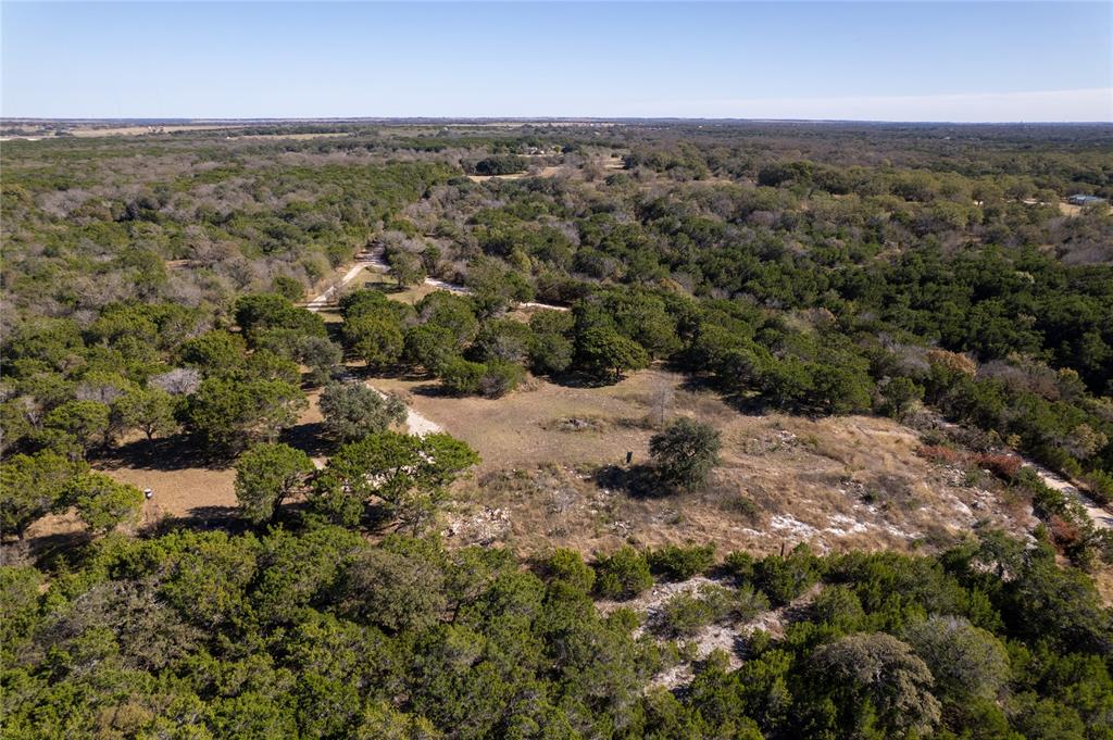 17574 Meador Grove Road Moody, TX 76557 - Photo 3 of 4 an aerial view of house with yard and mountain in the back