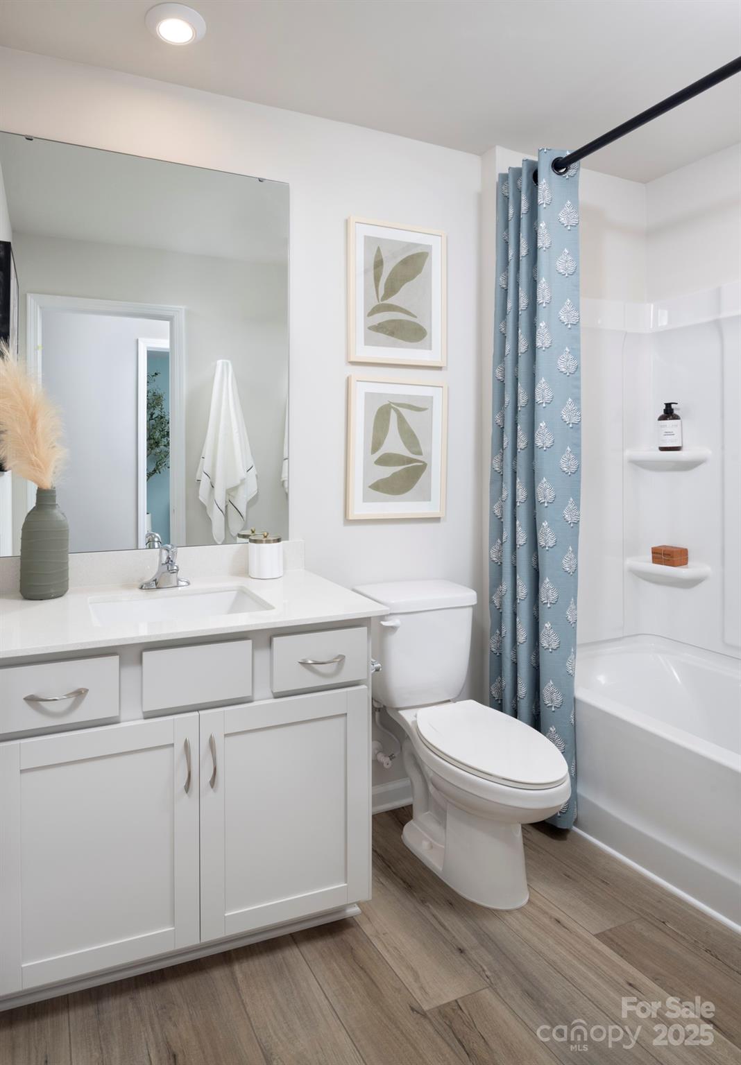 641 Cassidy Court Clover, SC 29710 - Photo 13 of 18 a bathroom with a sink toilet a mirror and shower