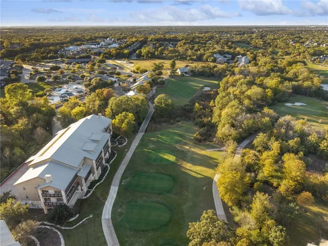 an aerial view of a building with outdoor space
