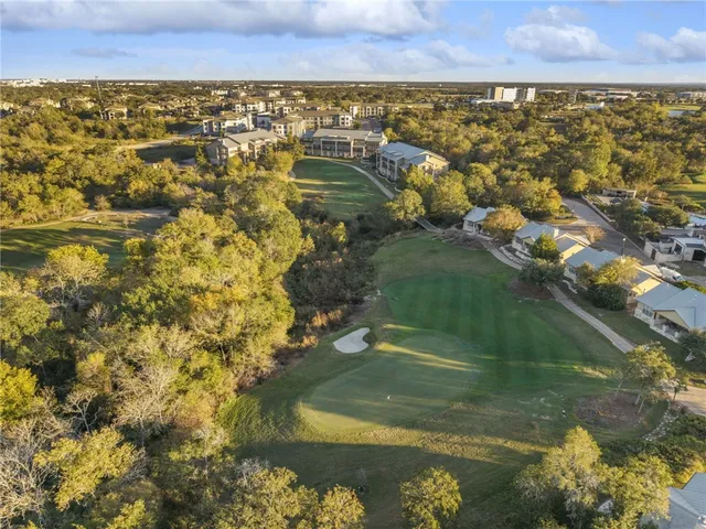 a view of balcony with furniture