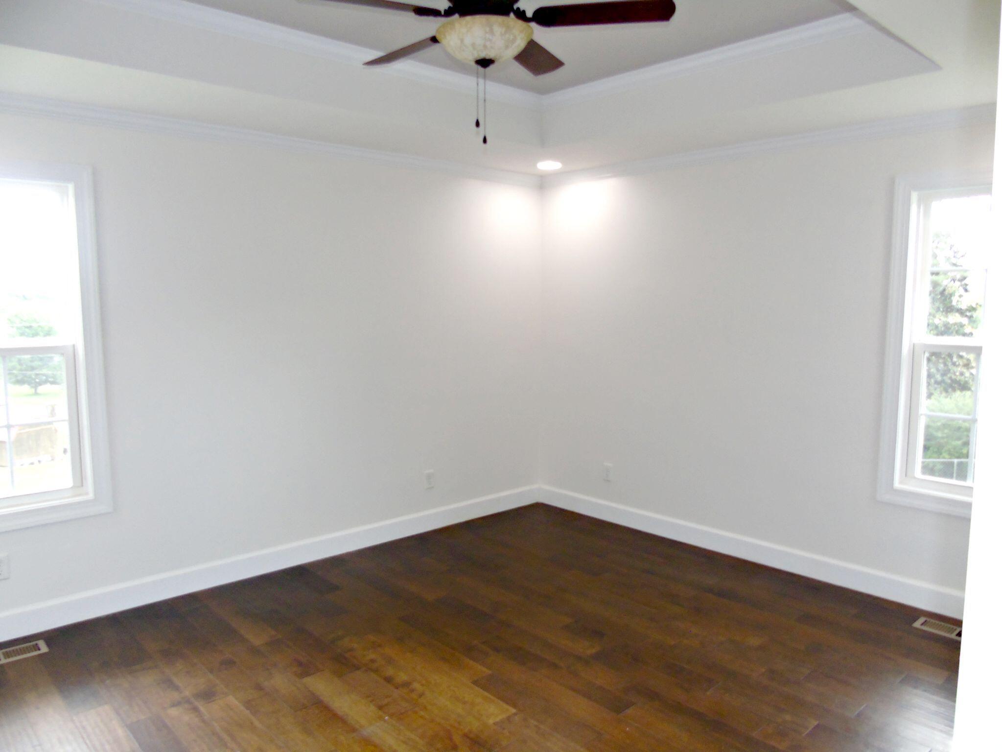 135 Joseph Daniel Lane Jasper, TN 37347 - Photo 16 of 27 Large main bedroom with fan.