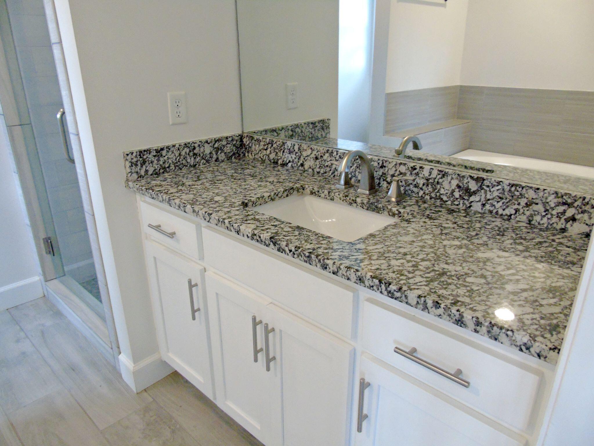 135 Joseph Daniel Lane Jasper, TN 37347 - Photo 17 of 27 Main bedroom granite top vanity